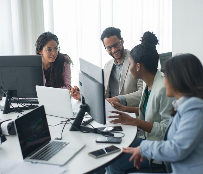 Team collaboration demonstrating our core principles